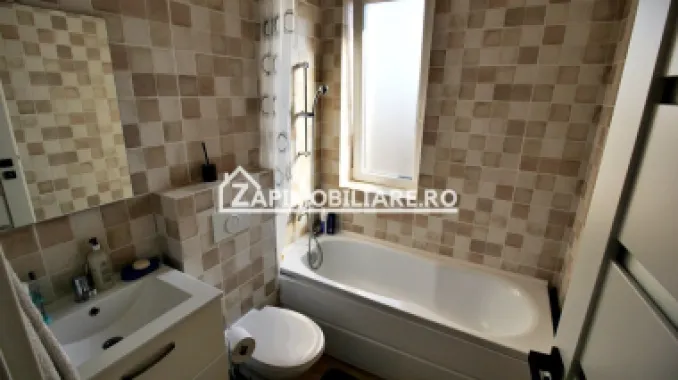 Apartament 3 camere,2 băi,bloc NOU,68mp,