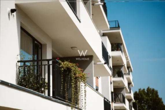 Logo Welhome Imobiliare logo