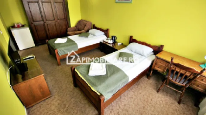 Pensiune aproape de centru,10 camere,13 băi,1 restaurant