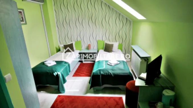 Pensiune aproape de centru,10 camere,13 băi,1 restaurant