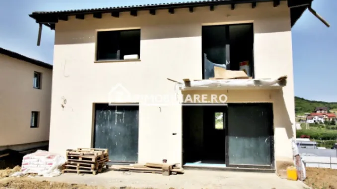 Casa 4 camere,2 bai,136 mp, 550 mp teren zona Corunca