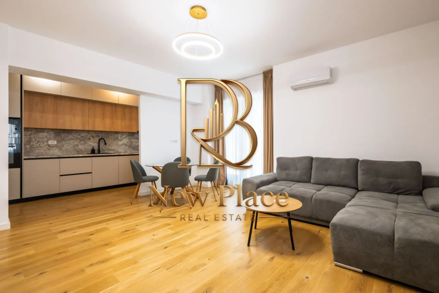 First Estate Pipera | Terase de 19 mp | Etaj intermediar | LUX - New Place Real Estate Company va propune spre inchiriere un apartament situat intr un Ansamblu rezidential dezvoltat in polul de business al Bucurestiului, un ansamblu care redefineste standardele de confort al locuintei, prin calitate si inovatie in constructie, finisaje superioare, compartimentari inteligente si solutii unice de eficientizare energetica.

Apartamentul este situat la Etajul 4/8 si are o suprafata utila totala de 92.70 mp (din care un balcon de 14.70 mp si inca unul de 4.20 mp), suprafata desfasurata astfel: living si dining cu suprafata de 23.00 mp, bucatarie semideschisa cu suprafata de 8.30 mp, dormitor matrimonial cu suprafata de 13.27 mp cu o baie proprie de 4.80 mp, dormitor secundar cu suprafata de 12.60 mp, baie cu suprafata de 3.70 mp si hol cu suprafata de 7.70.

Apartamentul dispune de un loc de parcare care se poate inchiria separat pentru suma de 70 Eur/Luna.

Acest ansamblu rezidential ofera INCALZIRE GRATUITA pentru toate apartamentele din ansamblu! Dispune de un sistem de pompe de caldura geotermala, precum si de un sistem de panouri fotovoltaice. Productia de energie asigurata de aceste sisteme, combinata cu o compartimentare inteligenta a apartamentelor, acopera atat incalzirea eficienta a locuintelor si spatiilor comune, precum si racirea pasiva (prin pardoseala). Costurile de incalzire sunt zero, avand in vedere ca productia de energie verde a ansamblului va avea un excedent anual de peste 50%. Incalzirea se realizeaza prin pardoseala si exista un sistem de monitorizare si control cu termostatare per apartament, cu multizonare in fiecare camera.

In ansamblu se afla doua parcuri verzi, proiectate meticulos pentru repaus si activitate fizica. Acestea ofera spatii pentru destindere, locuri de joaca pentru cei mici si echipamente de fitness pentru exercitii fizice in aer liber.

Finisajele de top completeaza calitatea constructiei, oferind un confort sporit rezidentilor ansamblului:
- Usi de intrare in cladire SCHUCO
- Usi de interior PORTA DOORS
- Lifturi de ultima generatie OTIS
- Usi de intrare in apartament GOLDEN DOOR
- Parchet triplu stratificat BARLINEK
- Tamplarie din PVC VEKA SOFTLINE82
- Gresie & faianta LA PAMESA / MARAZZI
- Obiecte sanitare DALET
- Baterii & accesorii de baie KLUDI
- Compartimentare interioara cu sistem din blocheți de ipsos KNAUF

Pentru mai multe detalii sau oferte similare, nu ezitati sa ne contactati.

Aceasta oferta apartine New Place Real Estate Company.