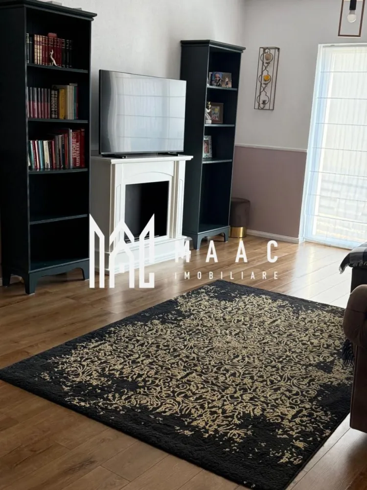 Casă tip duplex | 109 mpu | Bavaria Park Sibiu - MAAC Imobiliare va propune spre vanzare o casă modernă tip duplex situată în cartierul Bavaria din Sibiu, într-o zonă exclusivistă de case, liniștită, cu acces restricționat, ideală pentru cei care își doresc intimitate, confort și siguranță. Imobilul are o suprafață utilă de 109 mp, este mobilat și utilat complet și este dispus pe două niveluri, astfel: Parter: hol de acces bucătărie baie cu geam living spațios spațiu de depozitare (dressing) terasă generoasă, perfectă pentru relaxare Etaj: 3 dormitoare baie cu cadă dressing la unul dintre dormitoare balcon hol acces la pod Duplexul beneficiază de o grădină de aproximativ 150 mp, frumos amenajată, ideală pentru momentele petrecute în aer liber. Un alt mare avantaj al proprietății este priveliștea spectaculoasă spre Munții Făgăraș, precum și amplasarea pe o stradă liniștită, cu trafic redus și puține proprietăți în vecinătate. Această proprietate este alegerea ideală pentru o familie care caută liniște, confort și un stil de viață premium, într-un cadru natural deosebit, dar totodată aproape de oraș. Pentru mai multe detalii si programarea unei vizionari va rugam sa specificati ID: CP2893059. }}