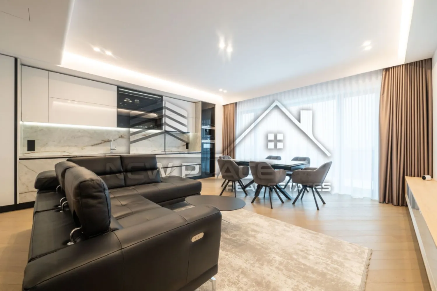 CORTINA 126 | Apartament exclusivist | Terasa 26 mp | View liber | ULTRA LUX - New Place Real Estate Company va propune spre vanzare un apartament exclusivist situat in Ansamblul residential CORTINA 126, un complex rezidential premium, localizat in zona de Nord a capitalei - Iancu Nicolae.

Apartamentul este situat la Etajul 8, are o suprafata utila totala de 127.00 mp, fiind compus din: living cu dining si bucatarie open space de 46.90 mp - bucataria fiind complet utilata si mobilata, un dormitor matrimonial cu zona de dressing de 23.60 mp si o baie proprie de 4.80 mp, un dormitor secundar de 16.30 mp, baie de serviciu de 3.90 mp, doua holuri de 3.10 mp respectiv 2.606 mp si o terasa de 25.80 mp.

CORTINA 126 este un Ansamblu rezidential care propune un concept de locuire exclusivist caracterizat prin finisaje si dotari high-end adaptate trendurilor pietei imobiliare din marile capitale ale lumii.

Conceptul de modern living inseamna sa te bucuri cat mai mult de timpul tau liber. Iar acest lucru incepe acasa. Pentru aceasta viziune Ansamblul Cortina 126 ia in calcul fiecare parametru al unui stil de viata exclusivist, de la finisajele si dotarile high-end pana la locatie si arhitectura.

Finisaje și dotări
- Fatada ventilata cu placi ceramice Florim
- Tamplarie din aluminiu Schuco cu geam tripan
- Climatizare LG cu control individual a temperaturii
- Usi de acces cu sistem de siguranta
- Control acces cu sistem videointerfon
- Usi interioare tip Filomuro
- Parchet din lemn cu incalzire in pardoseala
- Placari ceramice Florim
- Obiecte sanitare Daniel Rubinetterie
- Incalzire centralizata cu contorizare individuala
- Parcare subterana pe 3 niveluri
- Gradini si spatii verzi

Pentru mai multe detalii sau oferte similare, nu ezitati sa ne contactati.

Aceasta oferta apartine New Place Real Estate Company.