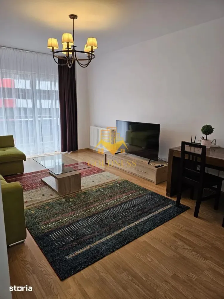 2 camere, parcare subterana, Cartier Buna Ziua, Bonjour Residence,LIDL - GOLDNESS Imobiliare vă propune spre închiriere un apartament cu 2 camere complet mobilat și utilat, la etajul 3 într-un imobil de 8 etaje, în Cartierul Bună Ziua .
 Dispune de loc de parcare subteran. 
Se află în apropierea stațiilor de transport în comun, magazine, restaurante, spații verzi, farmacii, etc. 
 Apartamentul este compartimentat astfel:
 - dormitor cu pat matrimonial, dressing, noptiere
 - living cu canapea extensibila, spatiu pentru depozitare
 - bucatarie complet mobilata, utilata, loc de luat masa
 - baie cu cadă, calorifer port prosop și dulap pentru depozitare.
 - terasă de 15 mp.

Imobilul este dotat cu toate cele necesare- centrală proprie, frigider, aragaz, hotă, mașină de spălat haine,   etc. 

Dacă sunteți interesați de acest apartament și doriți să îl vizionați, dar și pentru alte oferte nu ezitați să ne contactați telefonic sau prin e-mail. Vă stăm la dispoziție!
Pentru intermediere se percepe un comision de 50% din prețul chiriei!