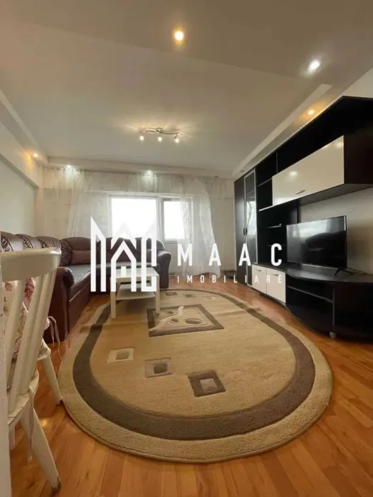 Apartament 3Camere I Decoandat I Etaj Intermediar I Turnisor - Vă propunem spre închiriere un apartament spațios cu 3 camere, situat la etajul 4 din 6 al unui imobil dotat cu lift, amplasat în cartierul Turnișor, o zonă apreciată pentru liniște, accesibilitate și dezvoltarea modernă din ultimii ani.

Locuința este complet mobilată și utilată, fiind pregătită pentru mutare imediată. Compartimentarea practică și suprafața generoasă oferă confort atât pentru familii, cât și pentru persoane care își doresc un spațiu de locuit bine organizat.

Caracteristici:
3 camere
Etaj 4 din 6
Imobil dotat cu lift
2 băi
Balcon
Complet mobilat și utilat
Disponibil imediat
Avantaje:
Spațiu generos și compartimentare eficientă
Ideal pentru familie
Zonă liniștită și bine conectată
Acces rapid către magazine, școli, grădinițe și mijloace de transport
Mutare imediată, fără investiții suplimentare
Se închiriază pe termen lung
Localizare:
Cartier Turnișor
Aproape de principalele artere de circulație și puncte de interes ale orașului

Un apartament modern și confortabil, situat într-o zonă foarte căutată, ideal pentru cei care își doresc spațiu, accesibilitate și un cămin pregătit pentru mutare imediată.

Pentru informati si vizionari: CP3162523