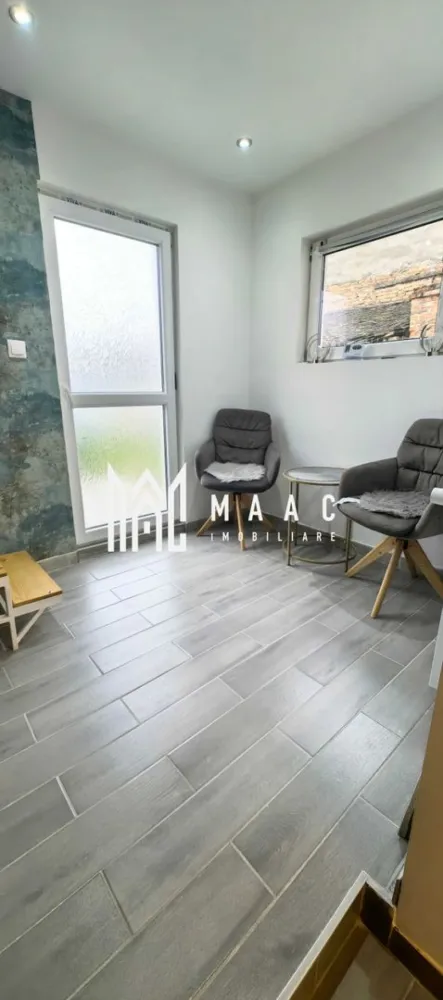 Casă individuala | 4 Camere | Gradina | 55MPU | Piața Cluj - MAAC Imobiliare vă propune spre vânzare o casă eficient compartimentată, situată în zona Piața Cluj, o locație apreciată pentru accesul rapid către centrul orașului și toate facilitățile urbane.

Caracteristici principale:
Suprafață utilă: 55 mp
Regim de înălțime: Parter + Etaj
Deschidere la stradă: 12 ml
Curte proprie
Cotă parte din curte comună
În curte mai există un singur vecin

Compartimentare:
Parter:
Living
Dormitor
Baie
Hol

Etaj:
2 dormitoare
Dressing / spațiu pentru depozitare

Localizare
Situată în zona Piața Cluj, proprietatea beneficiază de acces facil către centrul istoric, magazine, școli, grădinițe, farmacii și mijloace de transport în comun.

Pentru mai multe detalii și programarea unei vizionări, vă rugăm să contactați echipa MAAC Imobiliare și să menționați ID-ul proprietății: CP3111554.