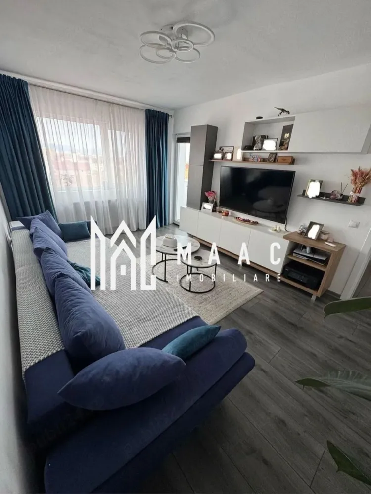 Apartament 3 Camere | 63 MPU | Etaj 9 | Vasile Aaron - MAAC Imobiliare vă propune spre vânzare un apartament modern cu 3 camere decomandate, complet renovat.

Caracteristici principale:
Suprafață utilă: 63 mp
Balcon: 3 mp
Boxă la subsol: 5 mp
Compartimentare decomandată
Se vinde complet mobilat și utilat
Disponibil pentru mutare imediată

Compartimentare:
Living
2 dormitoare
Bucătărie
Baie
Debara pentru depozitare
Balcon

Dotări și îmbunătățiri:
Instalație electrică complet schimbată
Instalație termică complet schimbată

Localizare
Amplasat într-o zonă liniștită, cu acces facil către magazine, școli, mijloace de transport și alte puncte de interes, apartamentul oferă toate avantajele unei locuințe confortabile și bine poziționate.

Pentru mai multe detalii și programarea unei vizionări, vă rugăm să contactați echipa MAAC Imobiliare și să menționați ID-ul proprietății: CP3147681.