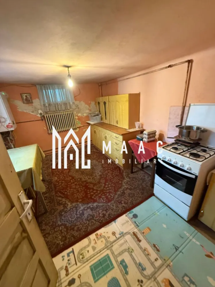 Casă individuală | 1.075 mp teren | 80 mp utili | Investiție | Zona Turnișor - Oportunitate Rară în Turnișor – Casă cu teren generos de 1.075 mp și potențial excelent de dezvoltare!

MAAC Imobiliare vă propune spre vânzare o proprietate deosebită situată în una dintre cele mai apreciate zone ale Sibiului – Turnișor, ideală atât pentru locuință, cât și pentru investiție imobiliară.

 Caracteristici principale ale proprietății:

Casă individuală
4 camere spațioase
2 băi
2 bucătării
Garaj
Teren în suprafață de 1.075 mp
Deschidere la stradă de 12.5ml
Izolatie 10 CM
 Amplasamentul oferă acces facil către principalele puncte de interes ale orașului, într-o zonă liniștită și bine dezvoltată.

 Potențial urbanistic excelent:
POT: 35%
CUT: 0,7

Pe teren se pot edifica construcții cu următoarele regimuri de înălțime:
 S + P + 1 + M
 S + P + 1 + R
 S + D + P + M

Această proprietate reprezintă o alegere ideală pentru dezvoltatori, investitori sau pentru cei care își doresc o locuință cu teren generos și multiple posibilități de extindere.

 Fie că doriți să renovați și să valorificați construcția existentă sau să dezvoltați un nou proiect imobiliar, această ofertă vă pune la dispoziție spațiul și parametrii urbanistici necesari pentru a transforma orice idee în realitate.

 Pentru mai multe detalii sau pentru a programa o vizionare, vă rugăm să ne contactați, specificând ID:CP3167377