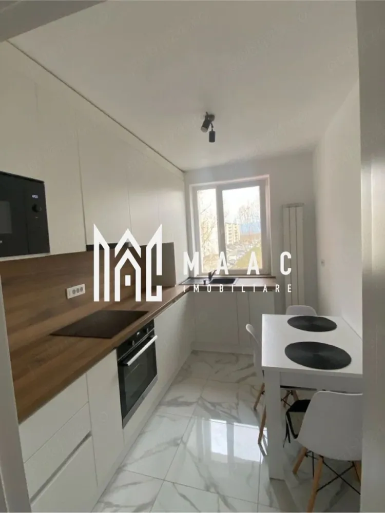 Apartament 2 camere decomandat | Hipodrom 1, Sibiu | 50 mp, balcon, etaj 4 - Apartament cu 2 camere decomandat, 50 mp utili, în Hipodrom 1, Sibiu, disponibil la închiriere cu 430 €/lună. Locuința este situată la etajul 4 și se predă complet mobilată și utilată, cu mutare imediată.

Detalii proprietate:
• Suprafață utilă: 50 mp, suprafață construită: 60 mp
• 2 camere, 1 dormitor, 1 baie, 1 bucătărie
• Compartimentare decomandată, confort 1
• Etaj 4 din 4, imobil construit în 1991
• 1 balcon acoperit
• Finisaje moderne
• Centrală termică proprie
• Mașină de spălat rufe, mașină de spălat vase, frigider și cuptor cu microunde
• Două televizoare
• Complet mobilat și complet utilat

Zona Hipodrom I oferă acces facil către Lidl, farmacii, supermarketuri, mijloace de transport și alte facilități necesare pentru traiul de zi cu zi.

Pentru detalii suplimentare și programarea unei vizionări, contactați consultantul MAAC Imobiliare. Cod anunț CP3170453.