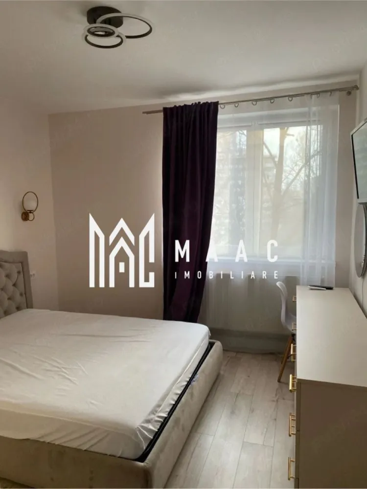 Apartament 2 camere decomandat | Hipodrom 1, Sibiu | 50 mp, balcon, etaj 4 - Apartament cu 2 camere decomandat, 50 mp utili, în Hipodrom 1, Sibiu, disponibil la închiriere cu 430 €/lună. Locuința este situată la etajul 4 și se predă complet mobilată și utilată, cu mutare imediată.

Detalii proprietate:
• Suprafață utilă: 50 mp, suprafață construită: 60 mp
• 2 camere, 1 dormitor, 1 baie, 1 bucătărie
• Compartimentare decomandată, confort 1
• Etaj 4 din 4, imobil construit în 1991
• 1 balcon acoperit
• Finisaje moderne
• Centrală termică proprie
• Mașină de spălat rufe, mașină de spălat vase, frigider și cuptor cu microunde
• Două televizoare
• Complet mobilat și complet utilat

Zona Hipodrom I oferă acces facil către Lidl, farmacii, supermarketuri, mijloace de transport și alte facilități necesare pentru traiul de zi cu zi.

Pentru detalii suplimentare și programarea unei vizionări, contactați consultantul MAAC Imobiliare. Cod anunț CP3170453.
