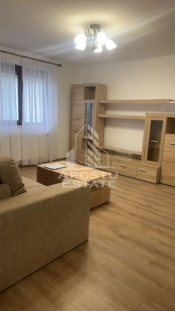 Apartament 2 camere de inchiriat ,loc de parcare, Giroc - Agentia imobiliara APOSTU ESTATE va propune spre inchiriere un apartament spaţios si luminos, cu 2 camere, situat in Timis, Giroc, pretabil pentru un cuplu sau persoane singure care isi doresc o locuinta primitoare si confortabila
-Suprafata utila: 57mp

Compartimentare eficienta:
-Hol de acces
-Bucatarie complet mobilata si utilata, cu loc de luat masa
-Living luminos si spatios
-Baie dotata cu dus

Confort si facilitati:
- Masina de spalat vase 
- 2 balcoane 
-Centrala termica proprie pe gaz
-Aer conditionat
-Dispune de loc de parcare privat
-Apartamentul este mobilat si utilat
-Localizare: zona Giroc

Ideal pentru:
-Familii
-Cupluri
Pret chirie lunara: 380 EUR
Va asteptam cu drag la o vizionare sa va imaginati viitorul aici!
Id intern: CP2890764