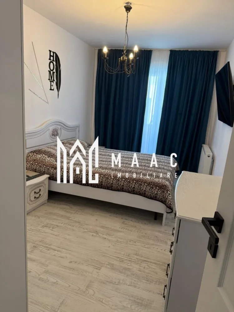 Apartament 3 camere | Sibiu Central | 64 mp, ultrafinisat - Apartament cu 3 camere, ultrafinisat, în zona Central din Sibiu, pe Calea Gusteriței, la etajul 3 din 4, cu 64 mp utili, terasă și două balcoane. O locuință modernă, luminoasă și bine organizată, pregătită pentru mutare imediată.

Detalii proprietate:
• Suprafață utilă: 64 mp
• Compartimentare: 3 camere, 2 băi, 1 bucătărie
• Etaj: 3 din 4
• An construcție: 2020
• Confort: Lux
• Stare interioară: ultrafinisat
• 1 loc de parcare
• 2 balcoane și o terasă de 12 mp
• Imobil cu lift
• Mobilat complet

Context și amplasare:
Proprietatea este situată în Sibiu, pe Calea Gusteriței, în zona Central, într-un imobil modern finalizat în 2020. Accesul este facil către punctele de interes din oraș, iar configurația apartamentului oferă spațiu util și funcționalitate pentru locuire de zi cu zi.

Pentru mai multe detalii sau pentru programarea unei vizionări, vă stăm cu drag la dispoziție. Cod anunț CP3173575. Contactați-ne pentru o vizionare și pentru informații suplimentare.