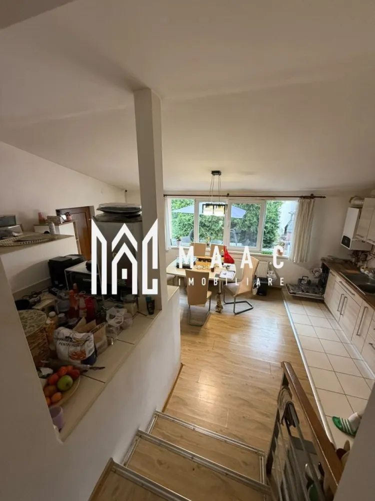 Casă de vânzare 4 camere | Lupeni, Sibiu | 141 mp utili, teren 676 mp - Casă individuală cu 4 camere în cartierul Lupeni din Sibiu, cu 141 mp utili și teren de 676 mp. Proprietatea oferă 2 băi, balcon și acces din două străzi.

Detalii proprietate:
• Casă individuală cu 4 camere, 2 dormitoare, 2 băi și 1 bucătărie
• Suprafață utilă: 141 mp
• Suprafață teren: 676 mp
• Balcon: 1
• An finalizare extindere: 2009
• Parterul include living, hol de acces, baie și bucătărie
• Etajul include 2 dormitoare, baie și balcon pe latura din spate
• Pod și pivniță pentru spații auxiliare
• Construcție cu placă de beton între niveluri; parter din cărămidă, etaj din BCA
• Izolație exterioară de 10 cm
• Centrală termică pe gaz cu calorifere, șemineu și panouri fotovoltaice
• Aer condiționat într-unul dintre dormitoare

Localizare și amplasare:
Proprietatea este situată pe Strada Teilor, în cartierul Lupeni din Sibiu, într-o zonă liniștită. Terenul are deschidere la stradă pe ambele laturi, cu front stradal de aproximativ 10 metri atât în partea din față, cât și în partea din spate.

Cod anunț CP3167574. Contactați-ne pentru o vizionare și pentru detalii suplimentare despre această proprietate.
