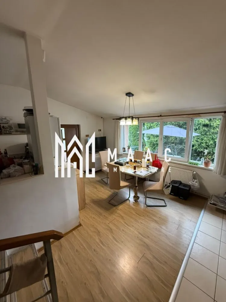 Casă de vânzare 4 camere | Lupeni, Sibiu | 141 mp utili, teren 676 mp - Casă individuală cu 4 camere în cartierul Lupeni din Sibiu, cu 141 mp utili și teren de 676 mp. Proprietatea oferă 2 băi, balcon și acces din două străzi.

Detalii proprietate:
• Casă individuală cu 4 camere, 2 dormitoare, 2 băi și 1 bucătărie
• Suprafață utilă: 141 mp
• Suprafață teren: 676 mp
• Balcon: 1
• An finalizare extindere: 2009
• Parterul include living, hol de acces, baie și bucătărie
• Etajul include 2 dormitoare, baie și balcon pe latura din spate
• Pod și pivniță pentru spații auxiliare
• Construcție cu placă de beton între niveluri; parter din cărămidă, etaj din BCA
• Izolație exterioară de 10 cm
• Centrală termică pe gaz cu calorifere, șemineu și panouri fotovoltaice
• Aer condiționat într-unul dintre dormitoare

Localizare și amplasare:
Proprietatea este situată pe Strada Teilor, în cartierul Lupeni din Sibiu, într-o zonă liniștită. Terenul are deschidere la stradă pe ambele laturi, cu front stradal de aproximativ 10 metri atât în partea din față, cât și în partea din spate.

Cod anunț CP3167574. Contactați-ne pentru o vizionare și pentru detalii suplimentare despre această proprietate.