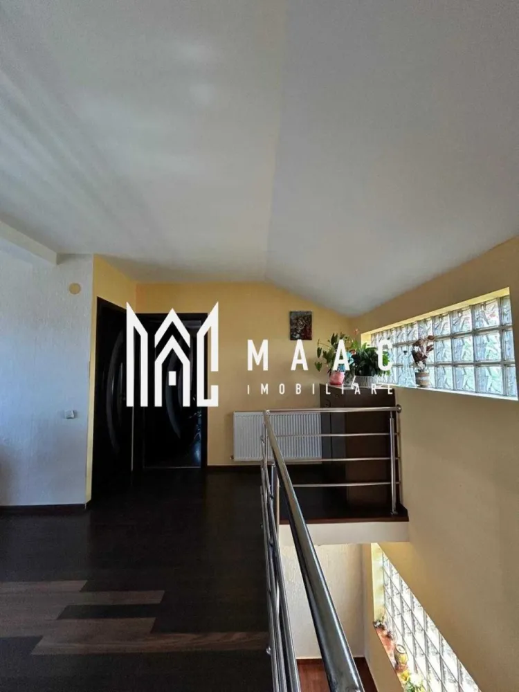 Casa de vanzare | Zona Straubing | Panouri fotovoltaice | 2 centrale | - MAAC Imobiliare vă propune spre vânzare o casă deosebită, excelent compartimentată, situată într-o zonă liniștită și căutată din cartierul Goranu, pe strada Straubing. Proprietatea este ideală pentru o familie care își dorește confort, independență energetică și spații generoase pentru relaxare.
Configurație inteligentă: Încăperi luminoase, optimizate pentru a oferi confort și intimitate.
Zone de relaxare: Terase spațioase, ideale pentru cafeaua de dimineață sau seri liniștite.
Curte amenajată: Foișor primitor pentru agrement, perfect pentru grătare și întâlniri cu prietenii.
Parcare: Garaj propriu, oferind siguranță pentru mașina dumneavoastră și spațiu suplimentar de depozitare.
Proprietatea este proiectată pentru costuri minime de întreținere și confort termic absolut, dispunând de:
Sistem hibrid de încălzire: Două centrale termice funcționale (o centrală pe gaz și o centrală pe combustibil solid).
Energie verde: Panouri fotovoltaice gata instalate, care reduc considerabil facturile de energie electrică.
Casa se află pe strada Straubing, în Goranu, o zonă curată și aerisită, cu acces rapid către principalele puncte de interes ale orașului.

Pentru mai multe detalii, fotografii suplimentare sau pentru a programa o vizionare, contactați cu încredere echipa MAAC Imobiliare, specificand ID 3177581