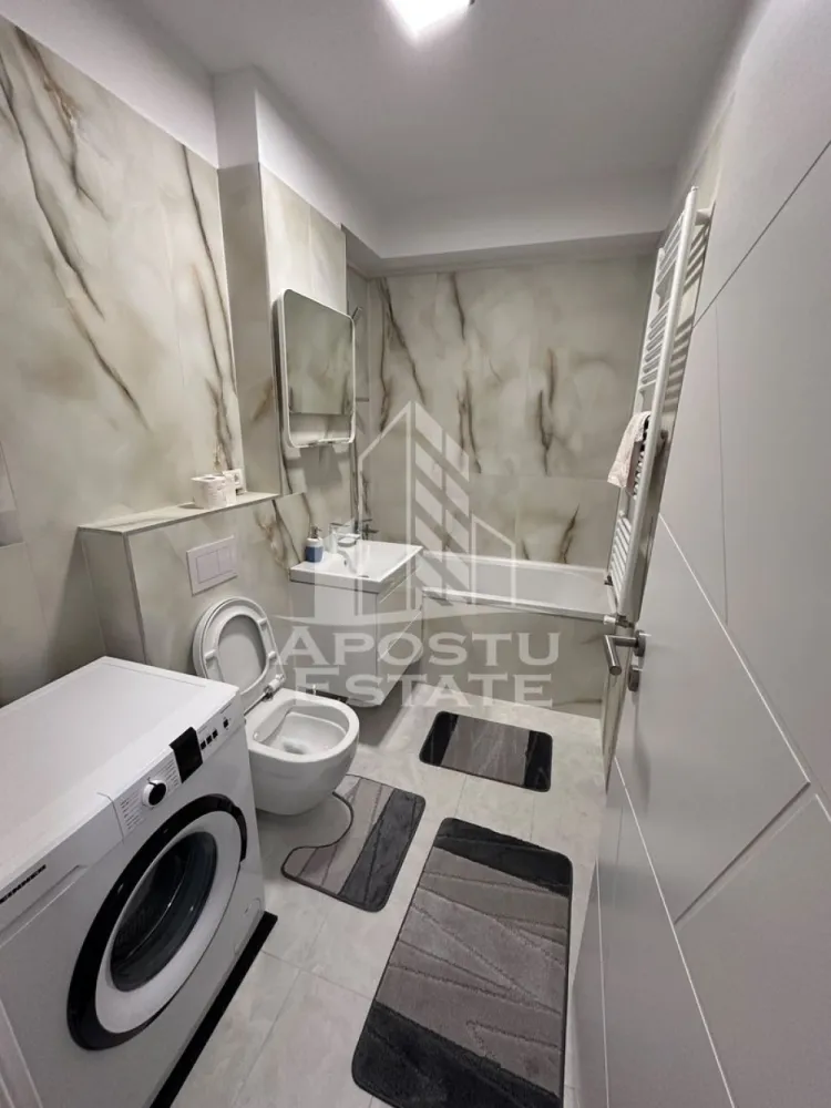 Apartament 1 camere de inchiriat,Dumbravita, Timisoara - Agentia imobiliara APOSTU ESTATE va propune spre inchiriere un apartament cu 1 camere, spatios si luminos, situat in zona Aradului, o zona linistita si bine pozitionata din Timisoara, potrivit pentru cupluri sau studenti care isi doresc o locuinta unde sa se simta confortabil si cu acces facil catre scoli, statii de autobuz, supermarketuri , magazine de zona, parcuri.

Suprafata utila: 46 mp
Compartimentare eficienta:
-Bucatarie complet mobilata si utilata, cu loc de luat masa
-Dormitor mobilat si utilat
-Baie prevazuta cu cada

Confort si facilitati:
-Incalzirea apartamentului: centrala proprie prin pardoseala
-Apartamentul este complet mobilat si utilat

Localizare:
-Timis,Timisoara, zona Aradului– acces facil spre magazine, scoli, parcuri si mijloace de transport in comun.

Ideal pentru:
-Cupluri
-Studenti

Disponibilitate: imediata
Pret chirie lunara: 350 euro 
Programeaza o vizionare pentru a-ti putea imagina viitorul aici!
ID intern: CP3177911