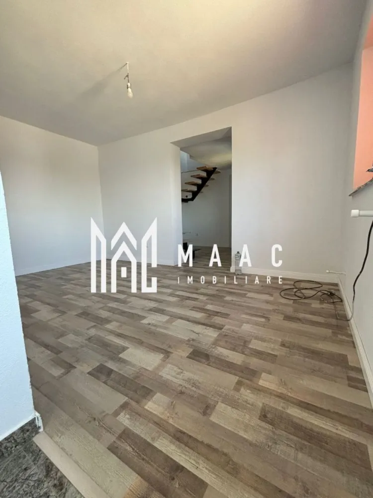 Casa Budesti 120 MPU |120 MP | Teren 360 mp | - MAAC Imobiliare vă propune spre vânzare o casă complet renovată, situată în Budești – Vâlcea, într-o zonă liniștită și apreciată, foarte aproape de oraș. Proprietatea se remarcă prin poziționarea excelentă la stradă principală, oferind acces rapid către principalele puncte de interes și toate facilitățile necesare unui stil de viață confortabil. Această casă este alegerea ideală pentru cei care își doresc intimitate, funcționalitate și o locuință pregătită pentru mutare imediată, într-o zonă rezidențială aflată în continuă dezvoltare.

Cu o suprafață utilă de 120 mp și teren de aproximativ 360 mp, proprietatea oferă spații generoase și bine optimizate, potrivite atât pentru o familie, cât și pentru cei care caută o investiție imobiliară sigură și valoroasă. Finisajele moderne, compartimentarea practică și curtea ușor de întreținut completează avantajele acestei proprietăți din Budești – Vâlcea.

Caracteristici:
-Casă complet renovată
-Suprafață utilă de 120 mp
-Teren de aproximativ 360 mp
-Locație excelentă, la stradă principală
-Zonă liniștită, aproape de oraș
-Ideală pentru locuit sau investiție
-Pregătită pentru mutare imediată

Compartimentare:
-Living spațios și luminos
-2 dormitoare confortabile
-Bucătărie practică și bine organizată
-Baie amenajată
-Cameră de lucru
-2 balcoane
-Terasă spațioasă
-Garaj
-Beci pentru depozitare suplimentară

Dotări și utilități:
-Centrală termică pe gaz
-Apă și canalizare
-Fântână proprie în curte
-Finisaje moderne
-Spații bine optimizate
-Curte ideală pentru relaxare

Avantaje:
-Poziționare foarte bună, aproape de oraș
-Acces facil către principalele puncte de interes
-Proprietate renovată complet, fără investiții suplimentare
-Curte practică și ușor de întreținut
-Ideală pentru familie
-Potențial excelent pentru investiție

Pentru mai multe detalii și programarea unei vizionări, vă rugăm să menționați CP3081971 în momentul apelului telefonic.