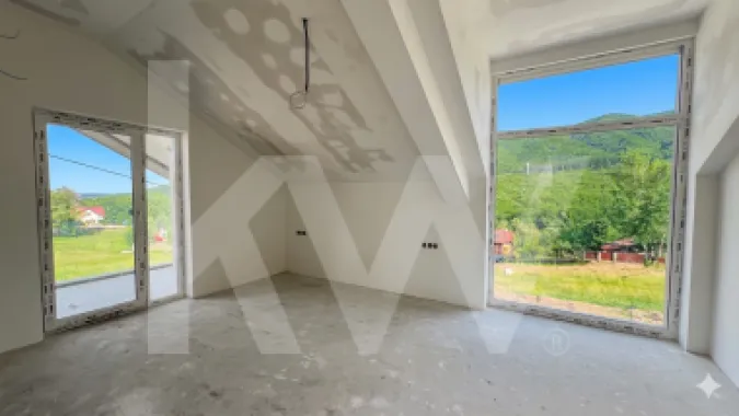 Casă arhitectură modernă cu panoramă spre Munții Făgăraș și Cetatea Cisnădioara