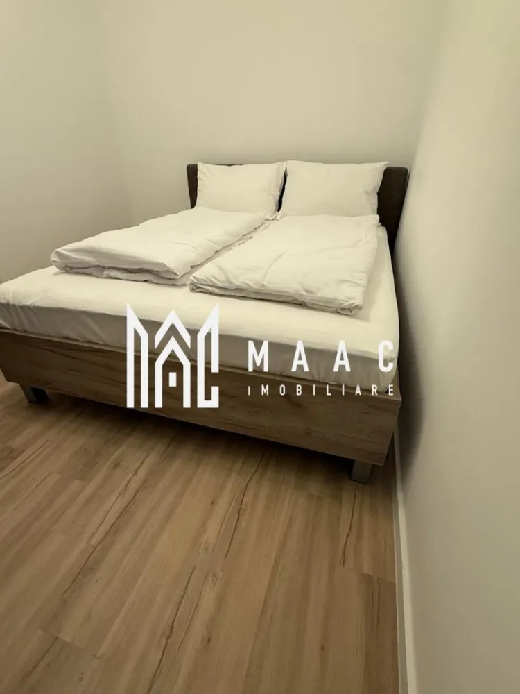 Apartament 2 camere | Renovat complet | Balcon | V. Aaron - MAAC Imobiliare vă propune spre vânzare un apartament cu 2 camere, situat în cartierul Vasile Aaron, una dintre zonele apreciate ale municipiului Sibiu, datorită accesului facil către centre comerciale, instituții de învățământ și mijloace de transport în comun.

Caracteristici:
Suprafață utilă: 48 mp
Etaj: 4 din 5
Compartimentare: semidecomandată
Centrală termică proprie
Încălzire prin calorifere
Apartament luminos și bine întreținut

Compartimentare:
Living
Dormitor
Bucătărie separată
Baie cu geam pentru aerisire naturală
Hol

Finisaje și dotări:
Pardoseală din lemn în living și dormitor
Gresie în bucătărie și baie
Tâmplărie interioară din lemn masiv
Centrală termică proprie
Calorifere
Bucătărie complet funcțională
Cuptor
Plită
Frigider

Avantaje:
Etaj intermediar
Baie cu geam de aerisire
Bucătărie separată
Ideal pentru locuire sau investiție

Localizare:
În apropiere se regăsesc toate facilitățile necesare unui stil de viață confortabil, iar accesul către centrul orașului și principalele artere de circulație este facil.

Pentru mai multe detalii și programarea unei vizionări, vă rugăm să contactați echipa MAAC Imobiliare și să menționați ID-ul proprietății: CP3171922