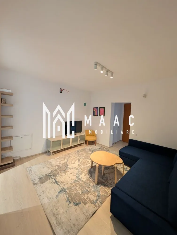 Apartament de vanzare Sibiu 3 camere semidecomandat | Calea Dumbravii | 64 mp - Apartament de vânzare în Sibiu, zona Calea Dumbrăvii, cu 3 camere semidecomandate și 64 mp utili, complet mobilat și utilat, potrivit pentru mutare rapidă.

Detalii proprietate:
• Suprafață utilă: 64 mp
• Suprafață construită: 77 mp
• Compartimentare: semidecomandat
• Parter într-un imobil cu 10 niveluri
• An construcție: 1980
• Stare interioară: bună
• Construcție finalizată, structură din cărămidă
• Aer condiționat, centrală proprie și geamuri termopan
• Mașină de spălat vase, mașină de spălat rufe cu uscător și televizor smart
• Complet mobilat și utilat
• Bloc izolat și loc de parcare privat inclus

Locuința este amplasată pe Strada Siretului, în zona Calea Dumbrăvii din Sibiu, într-o locație liniștită, în complex rezidențial cu loc de joacă.

Cod anunț CP3154641. Contactați echipa MAAC Imobiliare pentru detalii suplimentare și programarea unei vizionări.