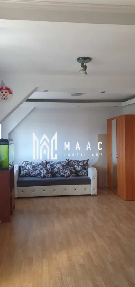 Apartament 3 camere | 58 MPU | Balcon | Iorga - MAAC Imobiliare vă propune spre vânzare un apartament tip mansardă cu 3 camere, dispus pe două niveluri, situat in zona Nicolae Iorga.

Caracteristici :
Suprafață utilă: 58 mp
Balcon: 6 mp
Apartament tip mansardă dispus pe 2 niveluri
Imobil construit în anul 2008
Apartament intabulat
Eligibil pentru credit bancar
Posibilitate de compartimentare a livingului pentru amenajarea unui al treilea dormitor separat
Se vinde mobilat.

Compartimentare:
Nivel 1:
Living cu nișă de bucătărie
Posibilitate de separare a livingului pentru amenajarea unui dormitor
Baie cu cadă și geam pentru aerisire naturală
Balcon

Nivel 2:
2 dormitoare
Hol
Acces prin scară interioară metalică cu trepte din lemn masiv

Dotări și finisaje:
Centrală termică nouă
Aer condiționat
Mașină de spălat rufe
Uscător de rufe
Mașină de spălat vase
Frigider
Mobilier și electrocasnice incluse conform prezentării

Localizare:
În vecinătate se regăsesc școli, grădinițe, magazine, farmacii, stații de transport în comun, centre comerciale și toate facilitățile necesare unui stil de viață confortabil.

Pentru mai multe detalii și programarea unei vizionări, vă rugăm să contactați echipa MAAC Imobiliare și să menționați ID-ul proprietății: CP3171984