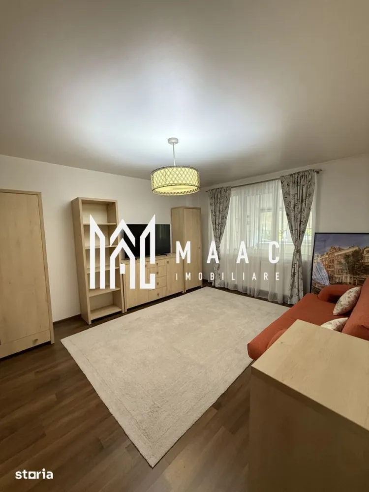Apartament 4 camere | Centru | 84 mpu | Parter | - MAAC Imobiliare vă propune spre vânzare un apartament spațios cu 4 camere, situat la parterul unui bloc solid din cărămidă cu regim de înălțime P+3. Cu o suprafață utilă de 84 mp și o compartimentare inteligentă, această proprietate este alegerea ideală pentru o familie care își dorește confort, funcționalitate și acces rapid către toate facilitățile orașului.
CaracteristiciApartament cu 4 camere
Suprafață utilă: 84 mp
Situat la parter
Bloc din cărămidă, regim de înălțime P+3
Compartimentare semidecomandată
Balcon închis
Se vinde complet mobilat
Vedere pe ambele laturi ale blocului
Compartimentare:
Hol generos de acces
Living luminos
2 dormitoare duble
Cameră destinată dressingului
Bucătărie
Baie
Balcon închis, amenajat ca zonă de dining și relaxare, cu canapea extensibilă tip lounge
Dotări:
Încălzire centralizată pe orizontală cu contorizare individuală
Instalație termică realizată din cupru
Balcon izolat
Ferestre cu tâmplărie PVC și geam termopan
Mașină de spălat rufe
Mașină de spălat vase
Combină frigorifică
Plită cu inducție
Hotă
Cuptor electric
Cuptor cu microunde
Televizor
Mobilier inclus în preț
Avantaje:
Suprafață generoasă și compartimentare practică, ideală pentru o familie
Parter, oferind acces facil pentru toate categoriile de vârstă
Zonă liniștită, aproape de școli, grădinițe, magazine și mijloace de transport în comun
La doar aproximativ 10 minute de centrul orașului
Vedere bilaterală, care asigură lumină naturală și o bună ventilare a locuinței
Se predă complet mobilat și utilat, fiind pregătit pentru mutare imediată
Prin dimensiunile sale generoase, dotările complete și amplasarea într-o zonă bine conectată, acest apartament reprezintă o oportunitate excelentă atât pentru locuință proprie, cât și pentru o investiție pe termen lung.
Pentru informații suplimentare și programarea unei vizionări, echipa MAAC Imobiliare vă stă la dispoziție. ID 3177605