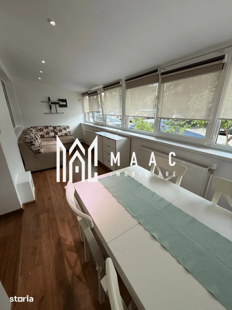 Apartament 4 camere | Centru | 84 mpu | Parter | - MAAC Imobiliare vă propune spre vânzare un apartament spațios cu 4 camere, situat la parterul unui bloc solid din cărămidă cu regim de înălțime P+3. Cu o suprafață utilă de 84 mp și o compartimentare inteligentă, această proprietate este alegerea ideală pentru o familie care își dorește confort, funcționalitate și acces rapid către toate facilitățile orașului.
CaracteristiciApartament cu 4 camere
Suprafață utilă: 84 mp
Situat la parter
Bloc din cărămidă, regim de înălțime P+3
Compartimentare semidecomandată
Balcon închis
Se vinde complet mobilat
Vedere pe ambele laturi ale blocului
Compartimentare:
Hol generos de acces
Living luminos
2 dormitoare duble
Cameră destinată dressingului
Bucătărie
Baie
Balcon închis, amenajat ca zonă de dining și relaxare, cu canapea extensibilă tip lounge
Dotări:
Încălzire centralizată pe orizontală cu contorizare individuală
Instalație termică realizată din cupru
Balcon izolat
Ferestre cu tâmplărie PVC și geam termopan
Mașină de spălat rufe
Mașină de spălat vase
Combină frigorifică
Plită cu inducție
Hotă
Cuptor electric
Cuptor cu microunde
Televizor
Mobilier inclus în preț
Avantaje:
Suprafață generoasă și compartimentare practică, ideală pentru o familie
Parter, oferind acces facil pentru toate categoriile de vârstă
Zonă liniștită, aproape de școli, grădinițe, magazine și mijloace de transport în comun
La doar aproximativ 10 minute de centrul orașului
Vedere bilaterală, care asigură lumină naturală și o bună ventilare a locuinței
Se predă complet mobilat și utilat, fiind pregătit pentru mutare imediată
Prin dimensiunile sale generoase, dotările complete și amplasarea într-o zonă bine conectată, acest apartament reprezintă o oportunitate excelentă atât pentru locuință proprie, cât și pentru o investiție pe termen lung.
Pentru informații suplimentare și programarea unei vizionări, echipa MAAC Imobiliare vă stă la dispoziție. ID 3177605