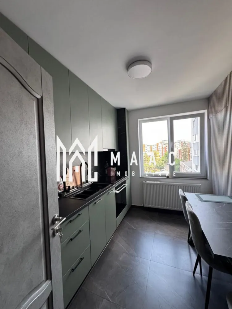 Apartament 2 camere | Ultracentral | Modern - Apartament 2 camere ultracentral – modern, mobilat complet, Râmnicu Vâlcea MAAC Imobiliare vă propune spre vânzare un apartament cu 2 camere, situat ultracentral în municipiul Râmnicu Vâlcea, ideal pentru locuit sau investiție. Apartamentul are o suprafață de 50 mp și este amplasat la etajul 4 din 4 al unui imobil bine întreținut. Locuința se remarcă printr-un design ultra modern, fiind complet mobilată și utilată, cu mobilier realizat pe comandă, gândit pentru a valorifica eficient spațiul. Un avantaj major îl reprezintă instalațiile termice și electrice complet schimbate, precum și finisajele de înaltă calitate, care oferă confort, siguranță și un aspect premium. Apartamentul este pregătit pentru mutare imediată, fără a necesita investiții suplimentare. Datorită poziției ultracentrale, beneficiază de acces rapid la instituții, magazine, restaurante, mijloace de transport și puncte de interes, oferind un stil de viață urban și comod. Ultracentral | Modern | Mobilat complet | Finisaje premium | Etaj 4/4 Pentru mai multe informații sau pentru programarea unei vizionări, MAAC Imobiliare vă stă la dispoziție. ID: CP2900867 }}