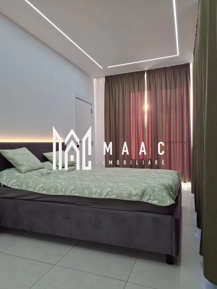 Penthouse Modern I Calea Surii Mici I Terasa Panoramica 55 MP - MAAC Imobiliare vă propune spre închiriere un penthouse deosebit, aflat la prima închiriere, situat într-un imobil nou din zona Calea Șurii Mici, Sibiu.

Această proprietate impresionează prin terasa panoramică spectaculoasă de 55 mp, un spațiu generos amenajat pentru relaxare, socializare și petrecerea timpului liber, oferind o priveliște deschisă asupra orașului și împrejurimilor.

Apartamentul dispune de o suprafață utilă de 52 mp și este amplasat la etajul 7 din 7, beneficiind de intimitate, lumină naturală din abundență și un confort aparte. Locuința este complet mobilată și utilată cu mobilier și electrocasnice moderne, fiind pregătită pentru mutare imediată.

Compartimentare:
* Hol de acces;
* Living luminos cu bucătărie open-space;
* Dormitor spațios;
* Baie modernă;
* Terasă panoramică de 55 mp.

Avantaje și beneficii:
✔ Prima închiriere;
✔ Imobil nou;
✔ Terasă generoasă de 55 mp;
✔ Zonă de barbeque amenajată;
✔ Terasă parțial acoperită;
✔ Mobilier de exterior inclus;
✔ Complet mobilat și utilat;
✔ Loc de parcare inclus;
✔ Disponibil imediat.

Zona Calea Șurii Mici este una dintre cele mai apreciate zone rezidențiale noi din Sibiu, oferind acces facil către centre comerciale, supermarketuri, mijloace de transport și principalele puncte de interes ale orașului.
Pentru mai multe detalii și programarea unei vizionări, vă rugăm să precizați telefonic că ați văzut anunțul: CP3179523