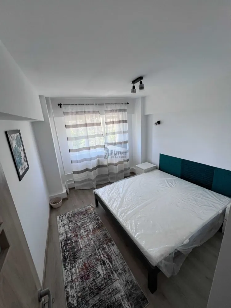 Inchiriez apartament 2 camere proaspat zugravit, mobila noua, centrala