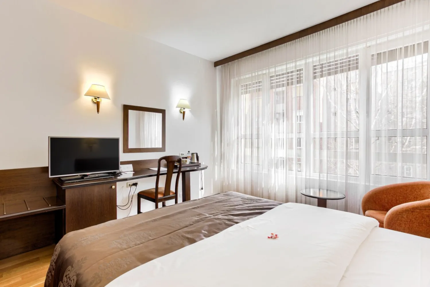 Investment Opportunity: 4-Star Best Western Hotel Arad - Romania - Executive Summary
We present a strategic acquisition opportunity for a premium, fully operational (turn-key) hotel asset: the 4-Star Best Western Central Hotel in Arad. Located ultra-centrally in one of the most important logistics and economic hubs on Romania's Western border, the hotel benefits from the recognition and standardization of one of the most powerful global hotel brands.
This transaction represents a rare opportunity to acquire not just a profitable business with a solid track record, but an exceptional real estate asset (over 5,300 sqm of prime city-center land), offering massive potential for expansion or diversification.

Market Performance & Positioning
Validated Business: Ranked 3rd in the "Top Business Romania" (2023) for Arad County, Hospitality Category.
International Affiliation: The Best Western franchise ensures a steady flow of corporate and leisure guests through its global reservation network, guaranteeing high operational standards.
Strategic Location: Arad is a vital transit node on the Pan-European Corridor, constantly attracting business tourism, transit, and MICE (Meetings, Incentives, Conferences, and Exhibitions) events.

Property Technical Details (Asset Profile)
Plot Size: 5,306 sqm (an extremely rare size for an ultra-central location, providing major future development options).
Gross Building Area (GBA): 4,038 sqm (Height regime: Basement + Ground Floor + 4 Floors).

Facilities Structure (Multiple Revenue Streams)
Accommodation: 41 premium rooms and 2 luxury suites, fully equipped to 4-star standards.
F&B (Food & Beverage): Elegant restaurant, private wine cellar, summer garden, and semi-covered terrace (ideal for private and corporate events).
MICE & Corporate: Fully equipped conference room, business meeting lounges, and office spaces.
Wellness: Dedicated fitness room for guests.

Investment Highlights
Immediate Cash-Flow: Fully operational property, generating revenue from Day 1.
High Barrier to Entry: The difficulty of developing a similar ground-up project in the city center gives this asset an unmatched competitive advantage.
Value-Add Potential: The vast land area allows for operational optimization, increasing accommodation capacity, or developing complementary facilities (e.g., a modern SPA or an extended conference center).

We invite investment funds, hotel chain operators, and private equity groups to explore the financial and operational details of this transaction.
Contact for Non-Disclosure Agreement (NDA) & Due Diligence:

Florin Moș – Investment Consultant / Representative
Phone: +40721356746
(Financial reports, cadastral plans, and historical occupancy rates can be provided upon qualified interest).