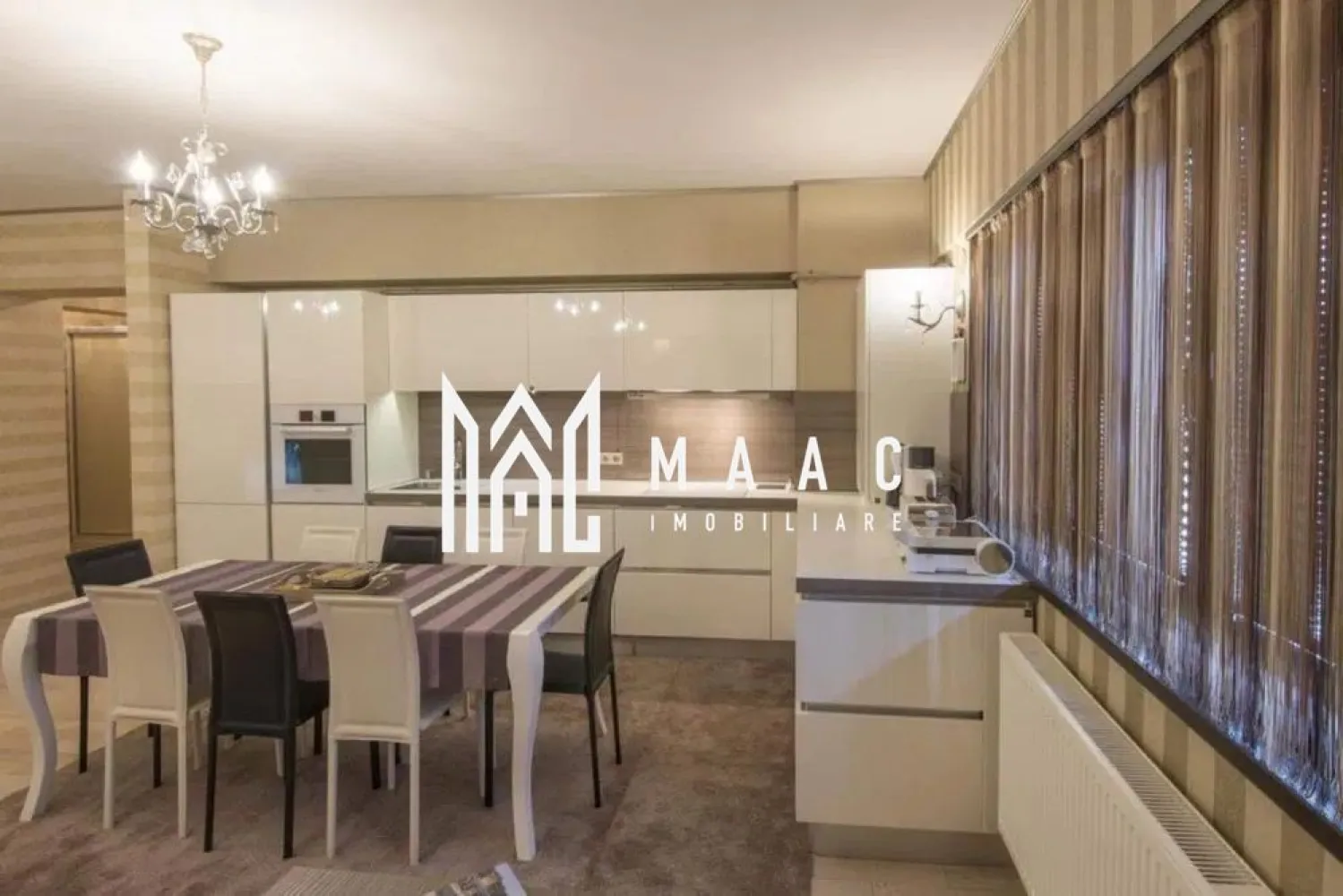 Apartament 3 camere | 110 mp I Zona Mihai Viteazul - MAAC Imobiliare vă propune spre închiriere un apartament cu 3 camere, situat într-o zonă foarte bine cotată pe piața imobiliară – Mihai Viteazu, aproape de școli, grădinițe și principalele puncte de interes ale orașului. Locuința are o suprafață utilă generoasă de 110 mp și este compartimentată eficient, oferind confort și funcționalitate la standarde ridicate. Zona de zi este formată dintr-un living spațios cu bucătărie open-space, completată de două dormitoare mari, două băi luminoase (ambele cu geam) și un balcon. Locuința este complet mobilată și utilată, beneficiind de dotări precum aer condiționat, mașină de spălat rufe, mașină de spălat vase, cuptor și parchet din lemn masiv. În plus, apartamentul dispune de garaj subteran și acces la lift. Se percepe o garantie in valoarea unei chirii lunare. Nu se accepta animale de companie. Pentru mai multe detalii va rugam specificati telefonic ID: CP2904319 }}