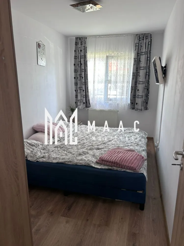 Apartament 3 camere | Parter | Parcare | 58 MP | Magnolia - MAAC Imobiliare va prezinta un apartament cu 3 camere situat in cartier Magnolia.

Localizare:
Apartamentul este situat în cartierul Magnolia, într-un bloc nou cu lift, într-o zonă liniștită și bine organizată, cu acces facil către puncte de interes, mijloace de transport, magazine și spații verzi.
Imobilul se află la parter intr-un bloc de 8 etaje.

Caracteristici:
Tip apartament: 3 camere semi-decomandat
Suprafață utilă: 58 mp
Suprafață totală: 68 mp
Etaj: Parter
Bloc dotat cu lift
Balcon: 10 mp, accesibil din living.

Compartimentare:
Hol de intrare
Baie complet echipată, dotată cu cada, mobilier sanitar și mașină de spălat rufe
Living open space, cu zonă de relaxare și bucătărie deschisă, complet mobilată și utilată, inclusiv cu electrocasnice
Două dormitoare, fiecare mobilat cu pat, șifonier și noptiere
Balcon generos de 10 mp.

Dotări și finisaje:
Centrală termică proprie Ferolli cu calorifere în toate camerele
Finisaje: pardoseli, uși interioare noi, tâmplărie PVC cu geam termopan
Ușă metalică la intrare.

Parcare:
Apartamentul dispune de loc de parcare cu carte funciară separată.

Pentru mai multe detalii precizati telefonic ca ati vazut anuntul cu ID: CP3068508