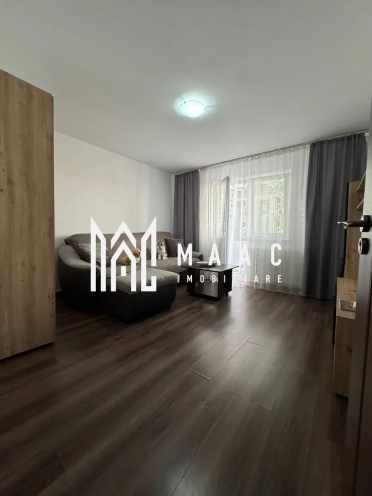 Apartament 2 camere de inchiriat | Zona Nord | Centrala proprie - MAAC Imobiliare vă propune spre închiriere un apartament de 2 camere modern și primitor, situat în zona Nord, pe strada Rapsodiei. Proprietatea este ideală pentru cei care își doresc un cămin gata de mutat, situat într-o zonă liniștită, dar cu acces rapid la toate facilitățile urbane.
• Compartimentare: 2 camere luminoase, confortabile și bine structurate.
• Mobilier: Complet mobilat și utilat modern, cu finisaje de calitate.
• Confort termic: Centrală proprie (costuri reduse de întreținere și control total asupra temperaturii).
• Poziționare: Zonă foarte liniștită, ferită de zgomotul arterelor principale.
• Cumpărături: Supermarketuri în imediata apropiere pentru cumpărăturile zilnice.
• Educație: Școli și grădinițe de renume la doar câteva minute de mers pe jos.
• Transport: Acces facil la stațiile de transport în comun.
Apartamentul este disponibil pentru mutare.
 Pentru mai multe detalii și programarea unei vizionări, nu ezitați să contactați echipa MAAC Imobiliare specificand ID3182388
