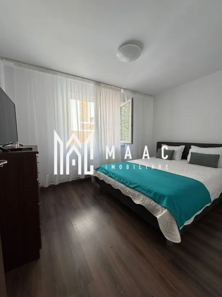 Apartament 2 camere de inchiriat | Zona Nord | Centrala proprie - MAAC Imobiliare vă propune spre închiriere un apartament de 2 camere modern și primitor, situat în zona Nord, pe strada Rapsodiei. Proprietatea este ideală pentru cei care își doresc un cămin gata de mutat, situat într-o zonă liniștită, dar cu acces rapid la toate facilitățile urbane.
• Compartimentare: 2 camere luminoase, confortabile și bine structurate.
• Mobilier: Complet mobilat și utilat modern, cu finisaje de calitate.
• Confort termic: Centrală proprie (costuri reduse de întreținere și control total asupra temperaturii).
• Poziționare: Zonă foarte liniștită, ferită de zgomotul arterelor principale.
• Cumpărături: Supermarketuri în imediata apropiere pentru cumpărăturile zilnice.
• Educație: Școli și grădinițe de renume la doar câteva minute de mers pe jos.
• Transport: Acces facil la stațiile de transport în comun.
Apartamentul este disponibil pentru mutare.
 Pentru mai multe detalii și programarea unei vizionări, nu ezitați să contactați echipa MAAC Imobiliare specificand ID3182388