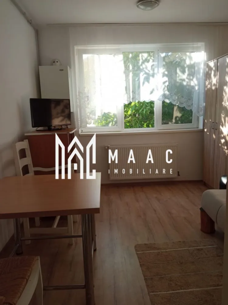 Garsoniera | Etaj 2 | 24 MPU | Terezian - MAAC Imobiliare vă propune spre închiriere o garsonieră situată în cartierul Terezian, într-o zonă liniștită și accesibilă, aproape de mijloacele de transport în comun și de toate facilitățile necesare traiului de zi cu zi.

Locuința este amplasată la etajul 2 și este complet mobilată și utilată, fiind pregătită pentru mutare imediată.

Detalii proprietate
Etaj 2
Garsonieră practică și bine compartimentată
Complet mobilată și utilată
Disponibilă imediat
Dotări și beneficii
Mobilier complet
Bucătărie utilată
Baie funcțională
Electrocasnice necesare pentru confortul zilnic
Spațiu ideal pentru o persoană sau un cuplu
Avantaje locație
Situată în cartierul Terezian
Stații de transport în comun în apropiere
Magazine de cartier la câteva minute de mers pe jos
Acces rapid către centrul orașului
Aproape de farmacii, supermarketuri și alte puncte de interes
Potrivită pentru
Persoană singură
Cuplu
Studenți sau angajați care își doresc acces facil către principalele zone ale orașului