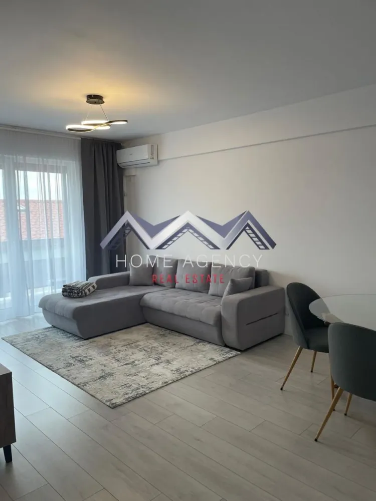 Apartament 2 camere Tunari | vedere spre pădure, include parcare - Descoperă un apartament cochet și elegant, disponibil imediat spre închiriere, situat în cadrul ansamblului rezidențial La Foresta Tunari, într-o zonă verde, liniștită și sigură, chiar lângă pădure. 📍 Etaj 2/2, într-un bloc nou, cu lift, proprietatea oferă un mix ideal de confort, funcționalitate și intimitate pentru cei care apreciază liniștea și aerul curat, dar și apropierea de București. ✅ Dotări și beneficii: - Complet mobilat și utilat (mașină de spălat rufe și vase, A/C etc.) - Încălzire în pardoseală - Living luminos + dormitor spațios - Bucătărie închisă - Terasă generoasă cu vedere spre pădure - Parcare deschisă în complex - Mijloace de transport în comun la intrarea în complex Situat la marginea pădurii, apartamentul oferă un cadru ideal pentru relaxare și locuire de calitate, într-un mediu verde și aerisit. 📞 Programează acum o vizionare! }}