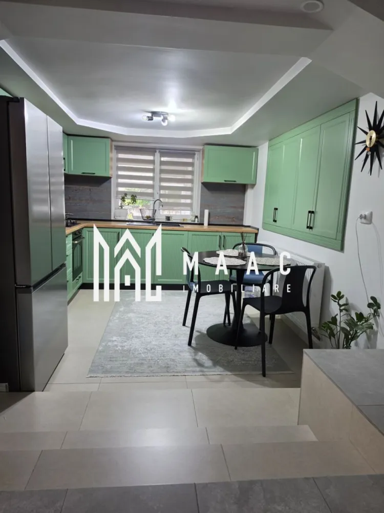 Vila moderna Fedelesoiu | Canalizare | Centrala peleti | Gaz limita proprietate - MAAC Imobiliare vă propune spre vânzare o vilă spectaculoasă, ideală pentru o familie care își dorește confort, spațiu generos și o oază de liniște într-o zonă excelentă din Fedeleșoiu.
________________________________________
• Localizare: Fedeleșoiu, Strada Brigăzii
• Suprafață teren: 650 mp (curte generoasă cu grădină )
• Configurație: Parter + Etaj + Mansardă
• Suprafață utilă parter + etaj: 220 mpu
• Suprafață utilă mansardă: 80 mpu
________________________________________
Parter:
• Living spațios și luminos
• Dormitoare primitoare
• Bucătărie completă
• Baie și hol de acces
Etaj:
• Living secundar / Zonă de relaxare
• Dormitor matrimonial
• Bucătărie proprie (ideal pentru independență sau familii extinse)
• Zonă dedicată pentru lectură
• Dressing spațios
Mansardă:
• Suprafață deschisă de 80 mp
________________________________________
• Încălzire eficientă: Centrală pe peleți KEPO 35 KW
• Apă caldă: Boiler Gorenje performant
• Utilități active: Canalizare racordată, curent electric
• Utilități la poartă: Gaz disponibil la limita proprietății
• Exterior: Curte mare, perfectă pentru relaxare, grătar sau spațiu de joacă
• Facilități zonale: Magazin alimentar în imediata apropiere, acces facil și rapid către oraș
________________________________________
Proprietatea este pregătită pentru a deveni noua dumneavoastră casă. Pentru detalii suplimentare, contactați MAAC Imobiliare, specificand ID 3184480