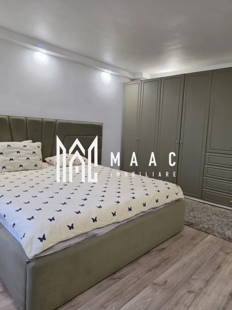 Vila moderna Fedelesoiu | Canalizare | Centrala peleti | Gaz limita proprietate - MAAC Imobiliare vă propune spre vânzare o vilă spectaculoasă, ideală pentru o familie care își dorește confort, spațiu generos și o oază de liniște într-o zonă excelentă din Fedeleșoiu.
________________________________________
• Localizare: Fedeleșoiu, Strada Brigăzii
• Suprafață teren: 650 mp (curte generoasă cu grădină )
• Configurație: Parter + Etaj + Mansardă
• Suprafață utilă parter + etaj: 220 mpu
• Suprafață utilă mansardă: 80 mpu
________________________________________
Parter:
• Living spațios și luminos
• Dormitoare primitoare
• Bucătărie completă
• Baie și hol de acces
Etaj:
• Living secundar / Zonă de relaxare
• Dormitor matrimonial
• Bucătărie proprie (ideal pentru independență sau familii extinse)
• Zonă dedicată pentru lectură
• Dressing spațios
Mansardă:
• Suprafață deschisă de 80 mp
________________________________________
• Încălzire eficientă: Centrală pe peleți KEPO 35 KW
• Apă caldă: Boiler Gorenje performant
• Utilități active: Canalizare racordată, curent electric
• Utilități la poartă: Gaz disponibil la limita proprietății
• Exterior: Curte mare, perfectă pentru relaxare, grătar sau spațiu de joacă
• Facilități zonale: Magazin alimentar în imediata apropiere, acces facil și rapid către oraș
________________________________________
Proprietatea este pregătită pentru a deveni noua dumneavoastră casă. Pentru detalii suplimentare, contactați MAAC Imobiliare, specificand ID 3184480