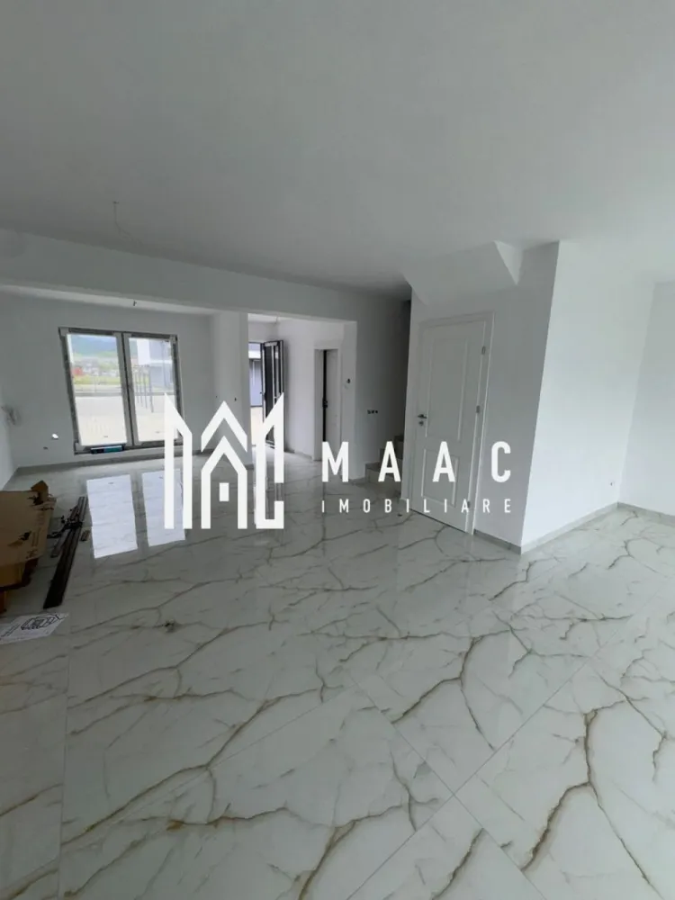 CASA NOUA I 4 CAMERE I 127 MP - Maac Imobiliare ofera spre vanzare casa noua, moderna si spatioasa, situata intr-o zona linistita, foarte aproape de oras

Locuinta este compartimentata eficient si dispune de :
- living generos open space cu bucatarie
- 3 dormitoare
- 2 bai
- dressing
- balcon 7.5 mp

Proprietatea este ideala pentru o familie care isi doreste confort, liniste si acces rapid catre oras

Pentru mai multe detalii si stabilirea unei vizionari anuntati telefonic CP3180961
