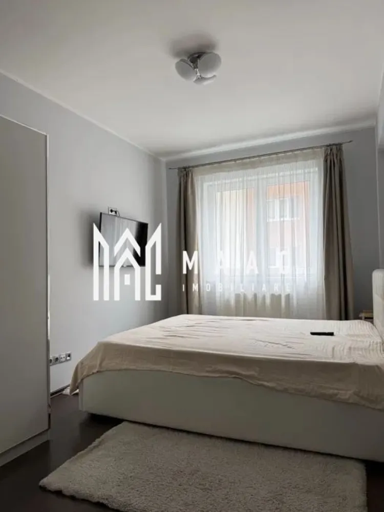 Apartament 2 camere decomandat | Terezian, Sibiu | 50 mp, lift, parcare - Apartament cu 2 camere decomandate de închiriat în Terezian, Sibiu, cu 50 mp utili, situat la etajul 2 al unui imobil finalizat, construit în 2010, dotat cu lift și pregătit pentru mutare imediată.

Detalii proprietate:
• Suprafață utilă: 50 mp
• Suprafață construită: 60 mp
• Compartimentare: 2 camere decomandate
• Etaj 2 din 5
• Imobil finalizat, construit în 2010
• Lift
• Balcon
• Loc de parcare inclus
• Complet mobilat și utilat
• Disponibil imediat

Zonă și acces:
Proprietatea este amplasată în zona Terezian, cu acces rapid către centrul orașului. În apropiere se află magazine, farmacii, școli, grădinițe și mijloace de transport, ceea ce oferă un plus de accesibilitate pentru locuirea de zi cu zi.

Cod anunț CP3185663. Contactați echipa MAAC Imobiliare pentru informații suplimentare și pentru programarea unei vizionări.