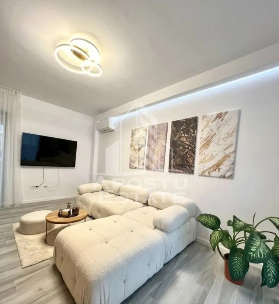 Apartament premium Giroc,mobilat si utilat,2 camere - Agentia Apostu Estate va propune spre vanzare un apartament exclusivist cu 2 camere, situat intr-un complex rezidential premium din Giroc. 

Aceasta proprietate reprezinta alegerea ideala pentru cei care isi doresc un stil de viata rafinat, imbinand confortul cu designul contemporan.

​Situat la parterul unui imobil cu regim redus de inaltime, apartamentul dispune de o suprafata utila de 55 mp, fiind compartimentat inteligent pentru a maximiza fiecare spatiu.

​Design si Finisaje:

 Apartamentul beneficiaza de finisaje ultramoderne, alese cu grija pentru a oferi un aspect unitar si sofisticat.

​Mobilier: 

Proprietatea se vinde complet mobilata si utilata, punand la dispozitie piese de mobilier premium, realizate pe comanda, care imbina estetica placuta cu functionalitatea.
​
Facilitati Rezidentiale: 

Locatarii complexului se pot bucura de acces la piscina exterioara, oferind un plus de relaxare chiar in confortul propriei locuinte.

​Parcare:

 Proprietatea include un loc de parcare privat, oferind siguranta si comoditate.

​Acest apartament este o oportunitate excelenta atat pentru cei care cauta o resedinta personala eleganta, cat si pentru investitorii care doresc un activ imobiliar atractiv, cu un potential ridicat de inchiriere datorita calitatii constructiei si facilitatilor oferite.

Va oferim consultanta si solutii financiare prin colaboratorii nostrii!

Va asteptam cu drag la o vizionare!