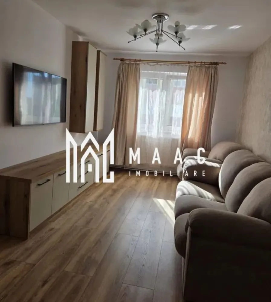 Apartament 2 camere decomandat | Valea Aurie, Sibiu | 47 mp, prima chirie - Apartament cu 2 camere decomandat de închiriat în Sibiu, în zona Valea Aurie, cu 47 mp utili, situat la etajul 2 din 4, renovat și pregătit pentru mutare imediată.

Detalii proprietate:
• Suprafață utilă: 47 mp
• Suprafață construită: 55 mp
• Apartament cu 2 camere decomandat
• Etaj 2 din 4
• An construcție: 1989
• Stare interior: renovat
• Complet mobilat și utilat
• Două balcoane
• Disponibil imediat
• Oferit la prima chirie

Valea Aurie este o zonă rezidențială apreciată din Sibiu, cu acces rapid către Parcul Sub Arini, Pădurea Dumbrava, zona Zoo, magazine, farmacii, școli și mijloace de transport.

Cod anunț CP3185788. Contactați echipa MAAC Imobiliare pentru informații suplimentare și pentru programarea unei vizionări.