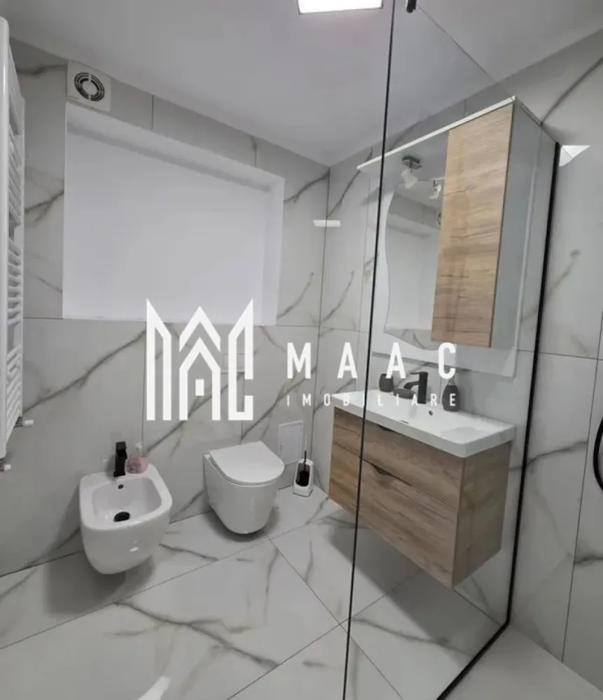 Apartament 2 camere decomandat | Valea Aurie, Sibiu | 47 mp, prima chirie - Apartament cu 2 camere decomandat de închiriat în Sibiu, în zona Valea Aurie, cu 47 mp utili, situat la etajul 2 din 4, renovat și pregătit pentru mutare imediată.

Detalii proprietate:
• Suprafață utilă: 47 mp
• Suprafață construită: 55 mp
• Apartament cu 2 camere decomandat
• Etaj 2 din 4
• An construcție: 1989
• Stare interior: renovat
• Complet mobilat și utilat
• Două balcoane
• Disponibil imediat
• Oferit la prima chirie

Valea Aurie este o zonă rezidențială apreciată din Sibiu, cu acces rapid către Parcul Sub Arini, Pădurea Dumbrava, zona Zoo, magazine, farmacii, școli și mijloace de transport.

Cod anunț CP3185788. Contactați echipa MAAC Imobiliare pentru informații suplimentare și pentru programarea unei vizionări.