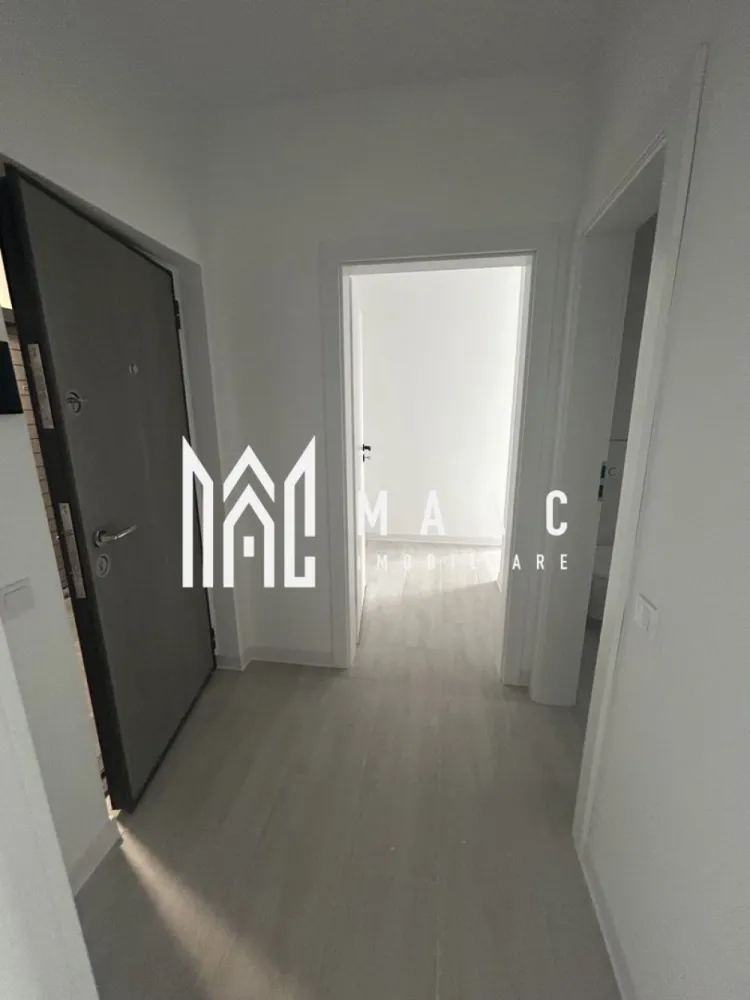 Apartament 2 camere | Parcare inclusă | Vedere panoramică | Doamna Stanca - MAAC Imobiliare vă oferă spre vânzare un apartament cu 2 camere, situat într-un imobil nou, potrivit atât pentru locuire, cât și pentru investiție, în zona Doamna Stanca. Apartamentul are o suprafață utilă de 55,1 mp și beneficiază de o compartimentare practică, fiind alcătuit din: -living spațios cu bucătărie open space, dormitor, baie, hol, balcon, balcon, pe care este amenajată o debara compartimentată, ideală pentru depozitare. Proprietatea este amplasată la etajul 4, într-un imobil bine poziționat, oferind confort, liniște și o vedere plăcută către munți și oraș, ce adaugă un plus de valoare locuinței. Locul de parcare este inclus, un beneficiu important pentru uzul zilnic. Apartamentul se poate preda la cheie, cu posibilitatea de mutare imediată, la prețul de 93.800 € + TVA. O proprietate ideală pentru cei care caută un apartament nou, modern și funcțional, într-o zonă în continuă dezvoltare. Pentru mai multe informatii si pentru a programa o vizionare, va rugam specificati ID: CP2905285 }}