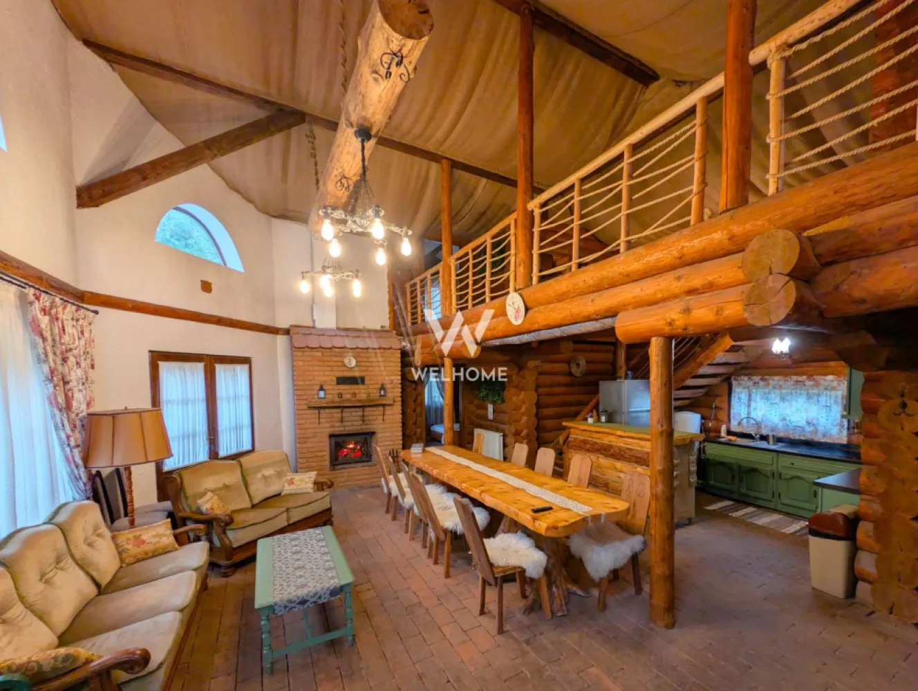 Cabana / Casa de vacanta pe Transfagarasan - Sibiu - Cabana "Rustic Balea" Această proprietate este o casă de vacanță tip cabană construită predominant din lemn masiv rotund, oferind un refugiu montan ideal pentru grupuri mari. Cabana are o capacitate optimă de cazare de opt persoane, fiind dotată cu patru dormitoare matrimoniale. Un avantaj major pentru confortul oaspeților este faptul că fiecare dormitor beneficiază de baie proprie, modern utilată cu cabină de duș. Spațiul de zi este extrem de generos, incluzând un living spațios cu tavan înalt, unde domină bârnele de lemn. Aici se găsesc o zonă de relaxare cu canapele amplasată lângă un șemineu tradițional din cărămidă și o masă lungă, din lemn masiv, pentru servit masa. Bucătăria interioară este complet utilată, integrată armonios în living, remarcându-se prin mobilierul vopsit în verde salvie. În ceea ce privește materialele, cabana utilizează bârne groase, rotunde, din lemn masiv pentru structura principală și pereții interiori, conferind o estetică autentică de log cabin și o izolare excelentă. Pardoseala combină plăcut dușumeaua de lemn din dormitoare cu cărămida sau piatra arsă din living. Pentru relaxare, cabana oferă facilități de wellness de lux: pe terasa exterioară, cu vedere directă la râu, se află un ciubăr (hot tub) din lemn. Lângă ciubăr, o saună privată interioară completează zona SPA. În exterior, există un foișor acoperit cu masă și bănci rustice, dotat cu o zonă de grătar din cărămidă. Cadrul natural este de vis, proprietatea fiind situată pe malul unui râu de munte, la poalele muntilor Fagaras. Datorită poziționării sale strategice, cabana servește ca punct de bază ideal pentru explorarea zonei Transfăgărășanului (DN7C). Cabana/casa de vacanta este listata pe site-urile cu profil turistic fiind foarte cautata si apreciata. Pret: 299.000 euro. Comision cumparator 2% + TVA. }}