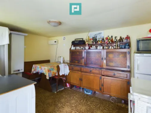 Casă cu teren generos, Turnu