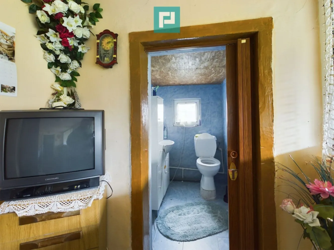 Casă cu teren generos, Turnu