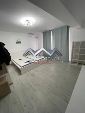 Garsonieră cu bucătărie închisă | include parcare